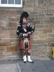A bagpipe player
