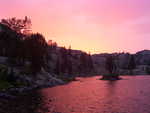 A beautiful, colorful sunset over a mountain lake