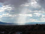A column of rain falling in the distance
