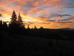 The sun setting behind the Colorado Mountains