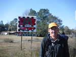 In front of an ‘Eat at Joe‘s’ sign near Sopchoppy