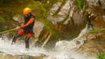 Abseiling down a waterfall