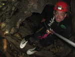 Abseiling into the cave