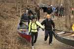 Carrying the boats to the launch during the race