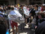 Many people wrapped in Mylar blankets in the finishing chute