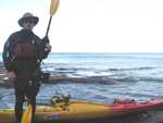 Donned in all the  protective gear needed to face the unforgiving lake