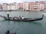 A gondola moving tourists around the water