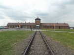 The train tracks leading through the guard house into Auschwitz-Birkenau