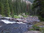 Looking down a long waterfall