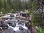 A river cascading through medium size rocks