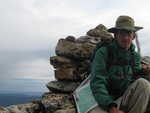 Myself huddled atop Lake View Mountain’s summit