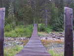 A rickety bridge across the river