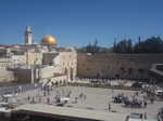 The Western Wall with Dome of the Rock in the background