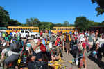 The organized chaos of loading over a hundred people into canoes all at once