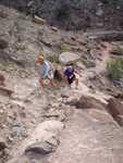 Runners climbing the ruff terrain