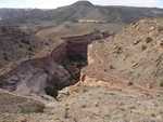 The narrow trail winding around a cliff