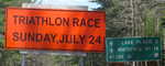 Road construction “Triathlon Race Sunday” sign